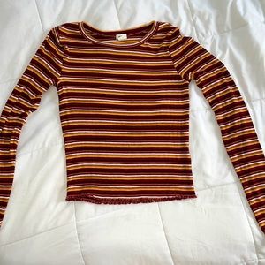 fall colored, striped long sleeve top